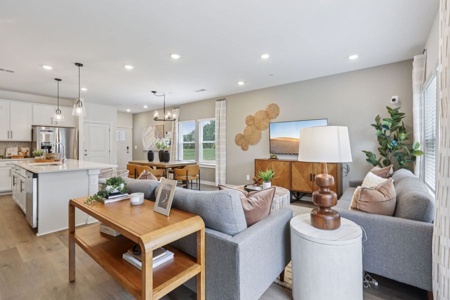 Furnished interior in a model home at Cedarcrest Townhomes in Fairview (Image 15).
