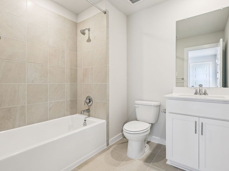 Furnished interior in a model home at Spring Brook Village - Luxe Series in Houston (Image 14). Furnished interior in a model home at Spring Brook Village - Luxe Series in Houston (Image 14).