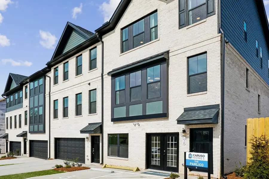 Condo located in Midtown Rows, Fuquay Varina, highlighting architectural design (Image 4).