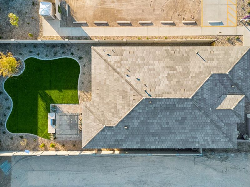 A building with a mural on the side. A building with a mural on the side.