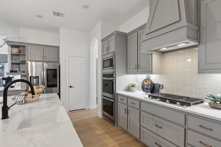 Furnished interior in a model home at Lovers Landing in Forney (Image 6).