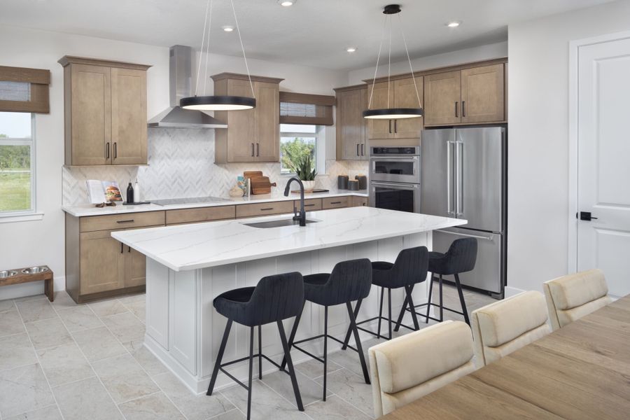 Furnished interior in a model home at Sun Bay Townes in Tampa (Image 3).