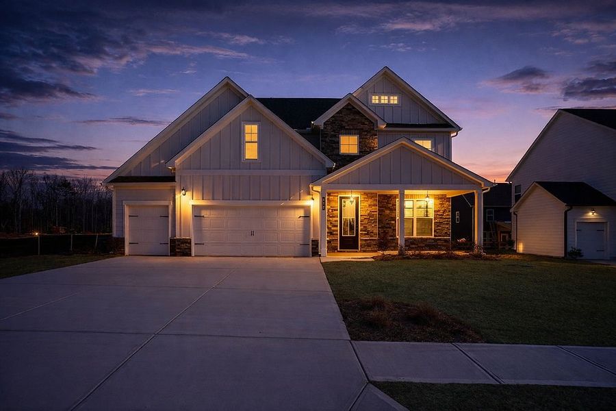 Front exterior of a home in the The Fairways at Mirror Lake community, located in Villa Rica, GA (Image 12). Front exterior of a home in the The Fairways at Mirror Lake community, located in Villa Rica, GA (Image 12).