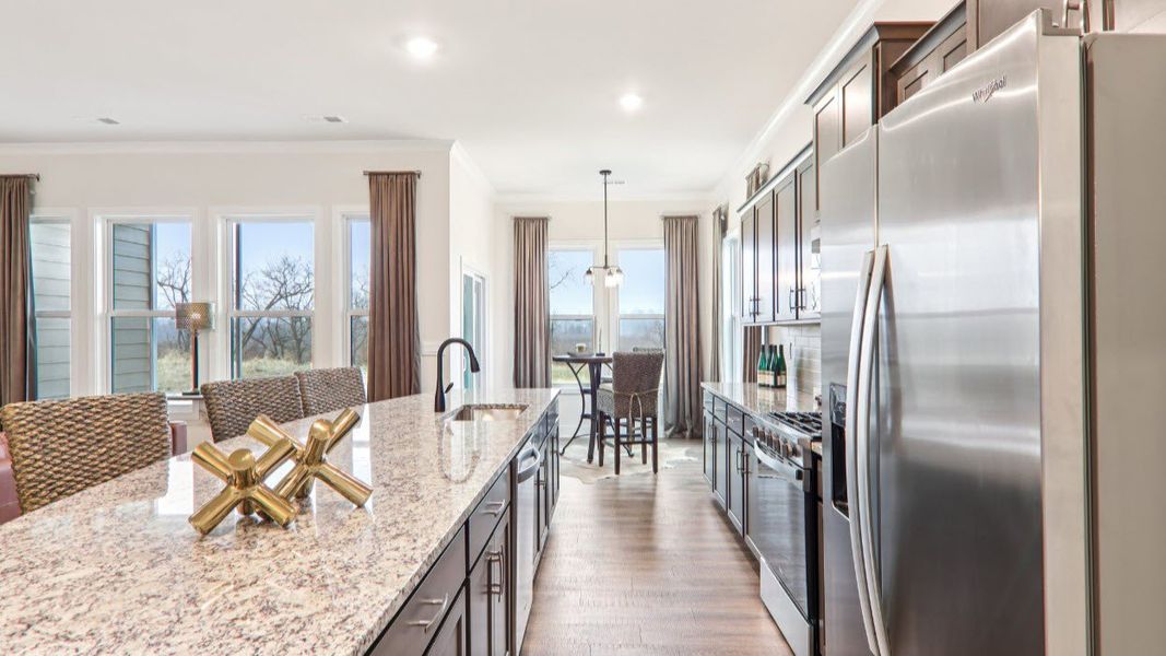 Furnished interior in a model home at Reserve at Tap Root Farms in Fletcher (Image 19).