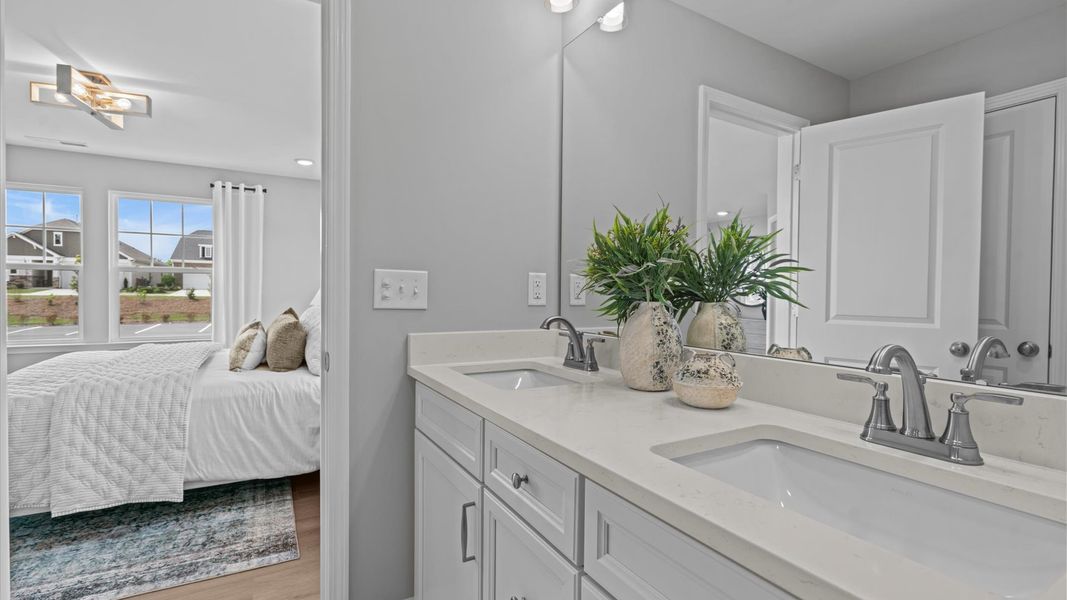 Furnished interior in a model home at Essex Townes in Franklinton (Image 18).