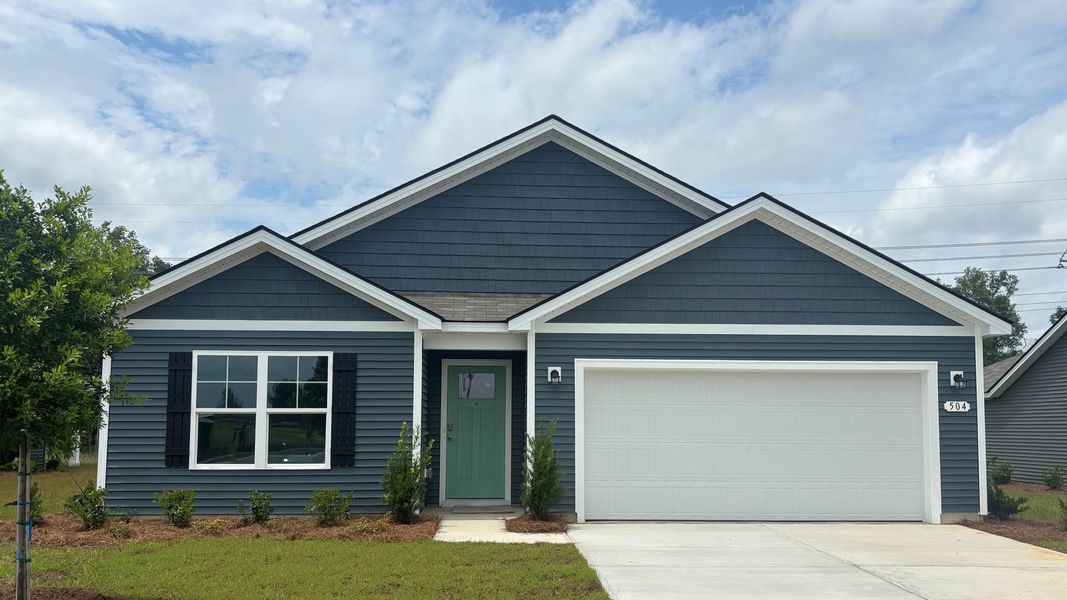 Front exterior of a home in the Dove Crossing community, located in Conway, SC (Image 12).