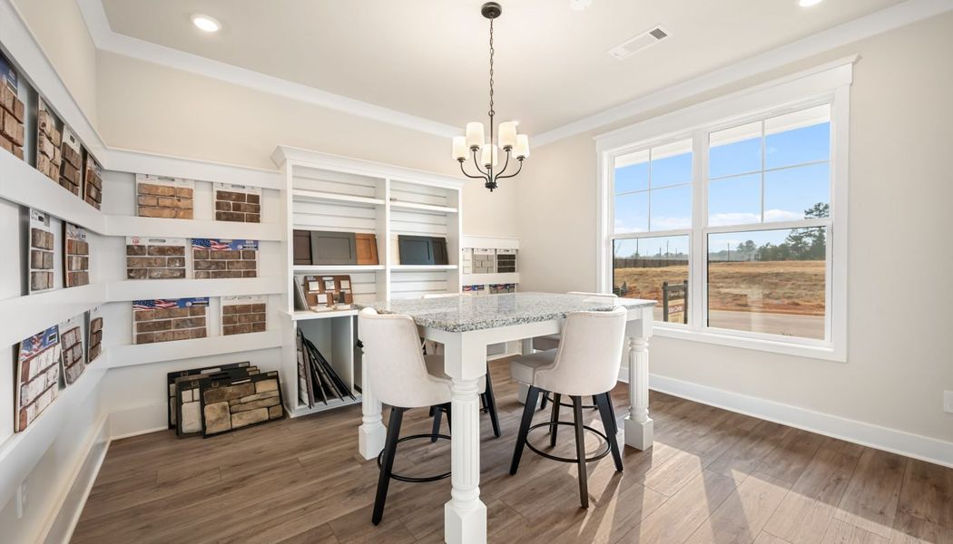 Furnished interior in a model home at Pinecrest Ridge in Dacula (Image 28).