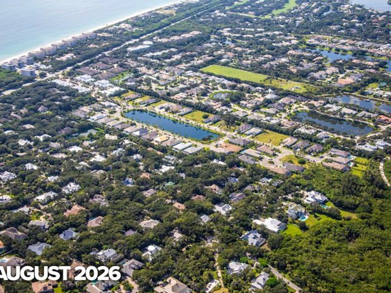 Aerial view of the The Strand community in Vero Beach, FL, showing layout and nearby surroundings (Image 8).
