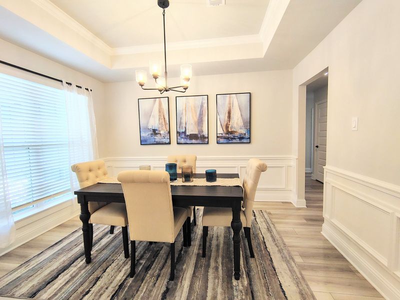 Furnished interior in a model home at Greystone in Angleton (Image 5).