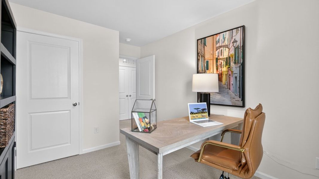 Furnished interior in a model home at The Townes at Belle Grove in Wendell (Image 34).