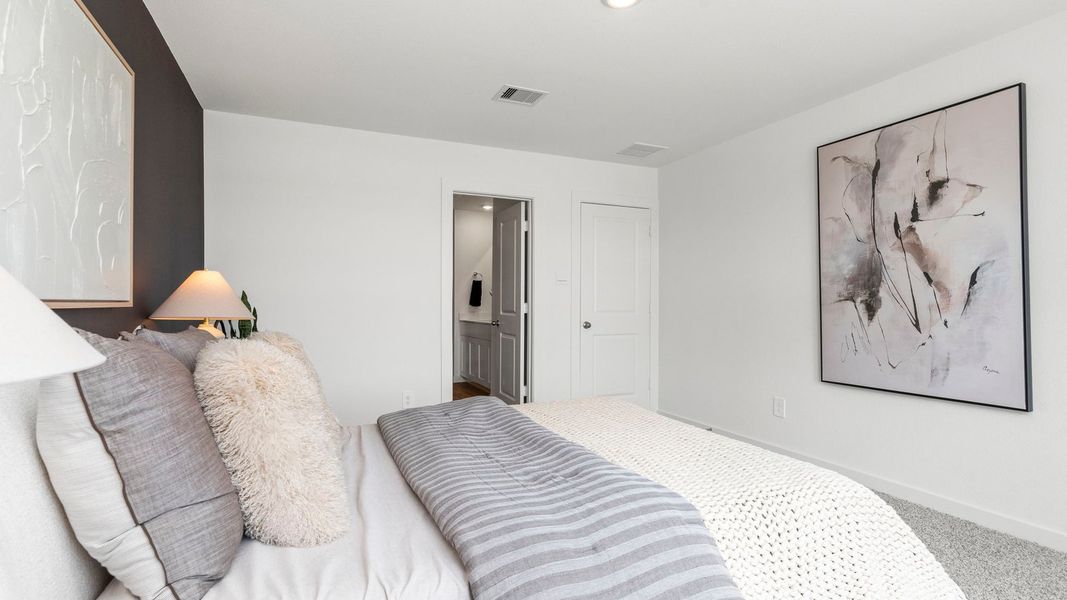 Furnished interior in a model home at Villarosa at Tamarron in Katy (Image 52).