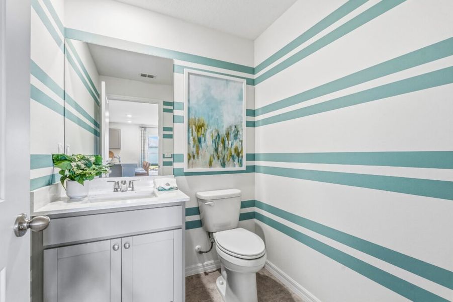 Furnished interior in a model home at Spanish Lakes in Port St. Lucie (Image 19).