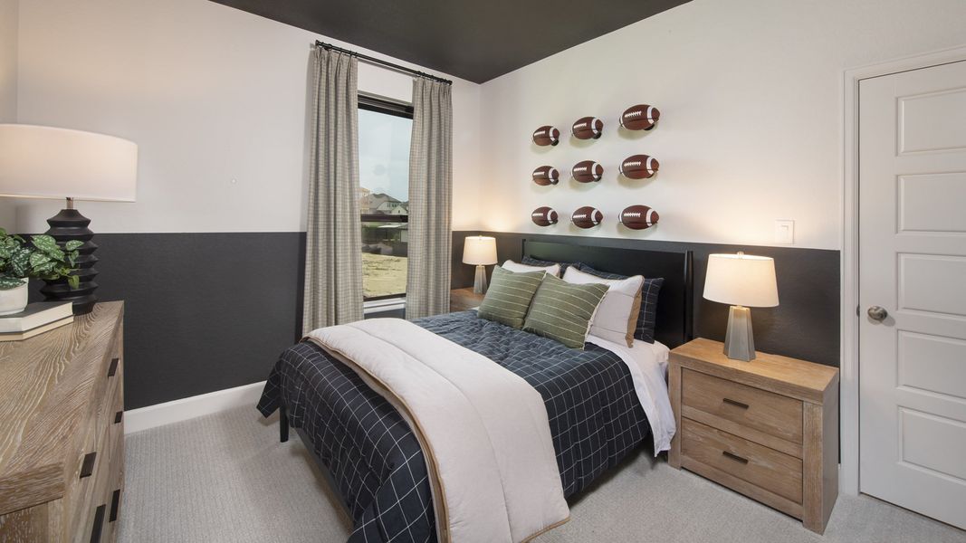 Furnished interior in a model home at Homestead 55' in Schertz (Image 19).