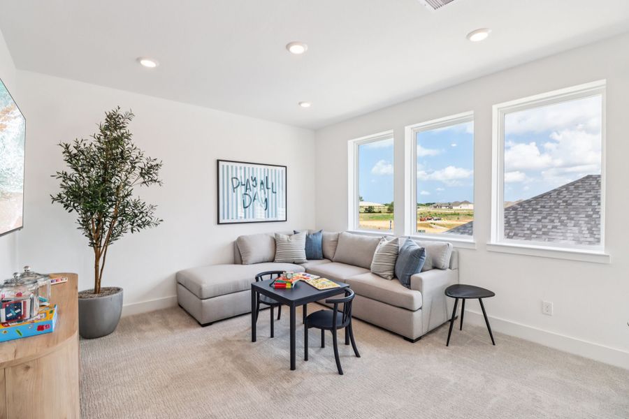 Furnished interior in a model home at The Cottages Collection at Oakberry Trails in Waller (Image 7).
