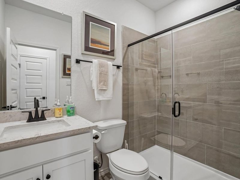 Furnished interior in a model home at Fairway Crossing in Converse (Image 12).
