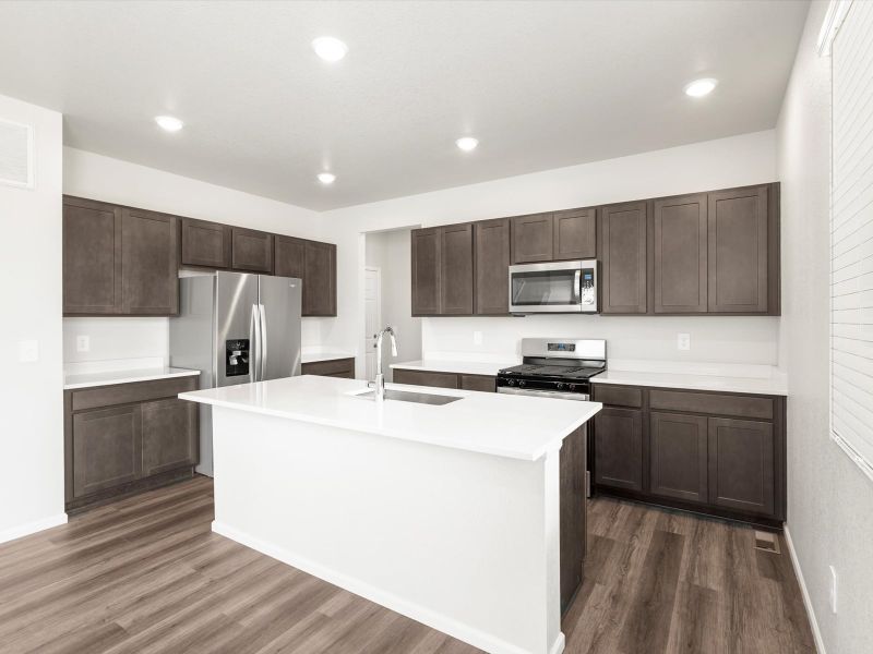 Furnished interior in a model home at Frontier Estates - The Flora Collection in Firestone (Image 14).