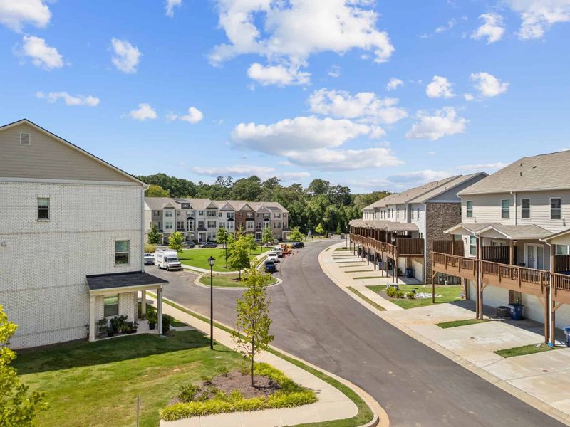 Aerial view of the Towns at Enclave community in Lawrenceville, GA, showing layout and nearby surroundings (Image 16). Aerial view of the Towns at Enclave community in Lawrenceville, GA, showing layout and nearby surroundings (Image 16).