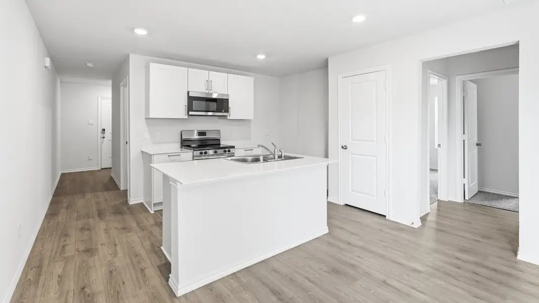 Furnished interior in a model home at Asher Oaks in Bonham (Image 3).