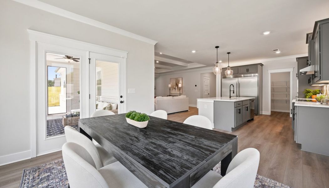 Furnished interior in a model home at Fowler Farms in Auburn (Image 83).