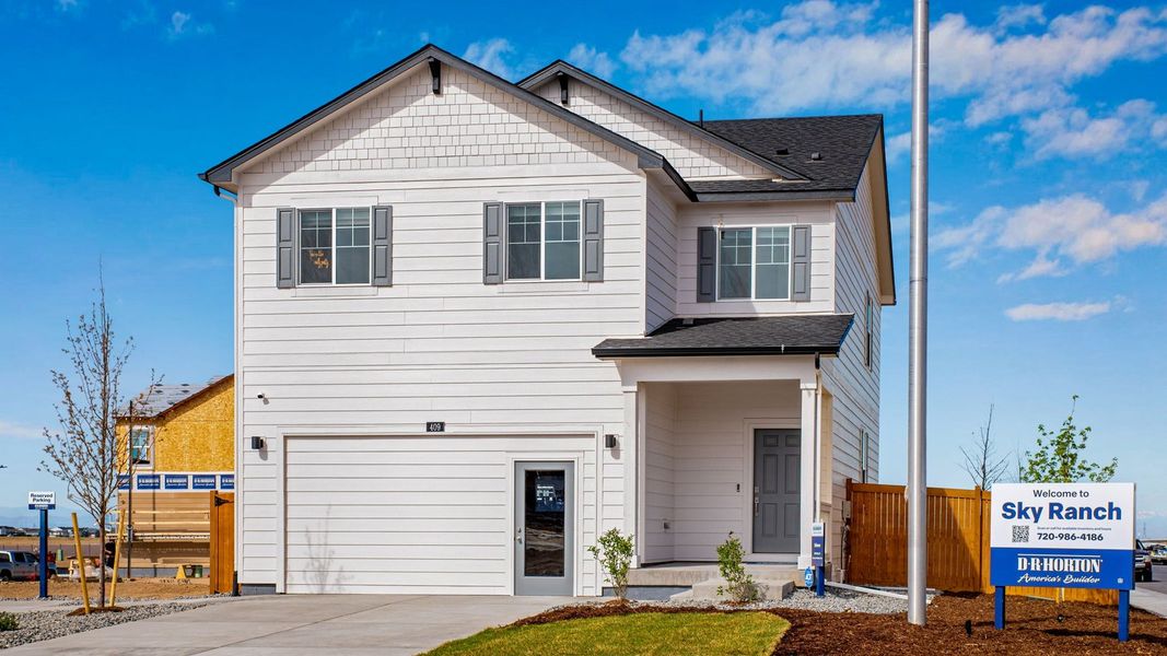 Front exterior of a home in the Sky Ranch community, located in Watkins, CO (Image 4).