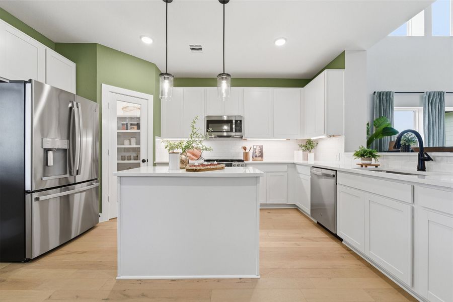 Furnished interior in a model home at Trails at Woodhaven Lakes in La Marque (Image 26).