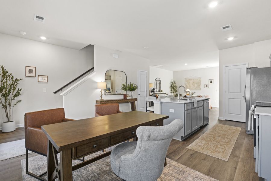 Furnished interior in a model home at Cypress Point in Graniteville (Image 10).