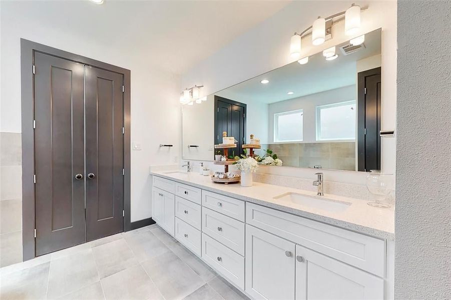 Furnished interior in a model home at Edwards in The Woodlands (Image 5).