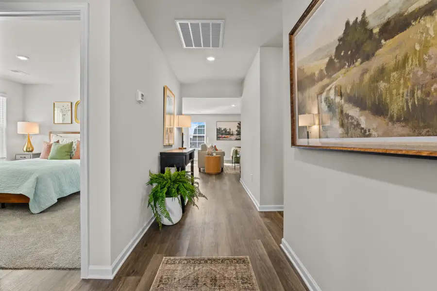Furnished interior in a model home at Canary Woods in Hopkins (Image 5).