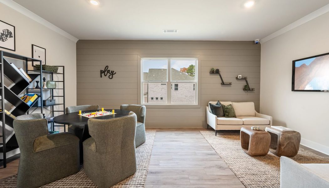 Furnished interior in a model home at Pinecrest Ridge in Dacula (Image 45).