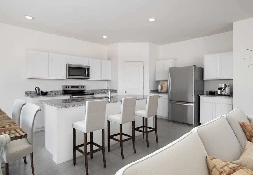 Furnished interior in a model home at Amarillo Creek in Maricopa (Image 6).