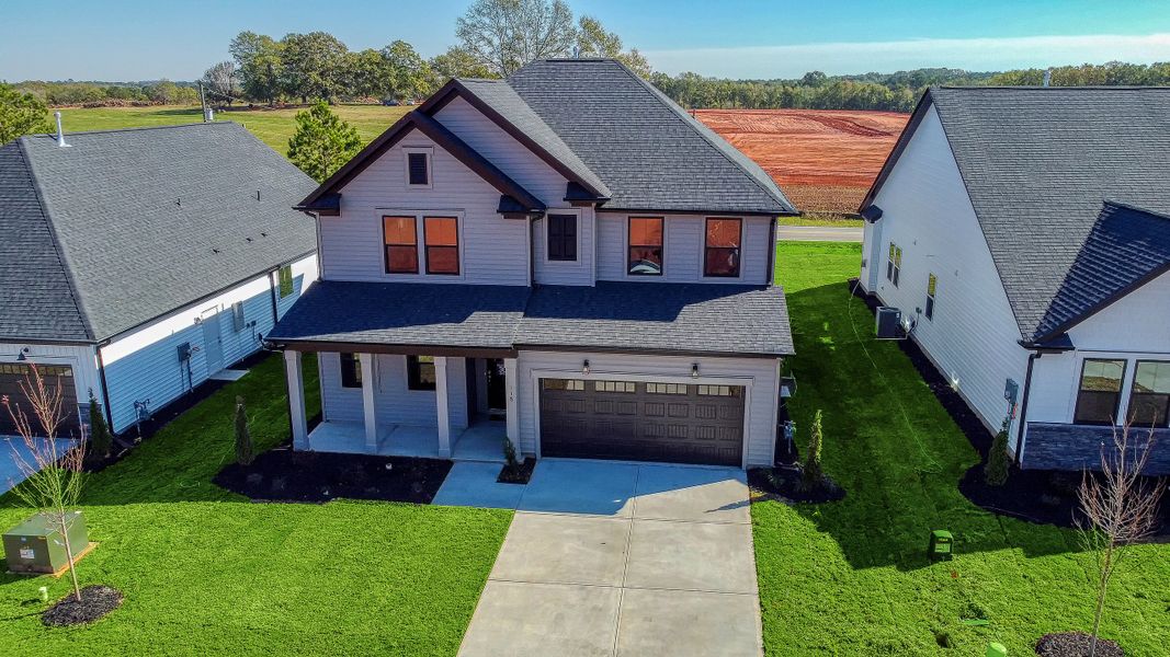 Front exterior of a home in the The Meadows at Midway community, located in Anderson, SC (Image 8). Front exterior of a home in the The Meadows at Midway community, located in Anderson, SC (Image 8).