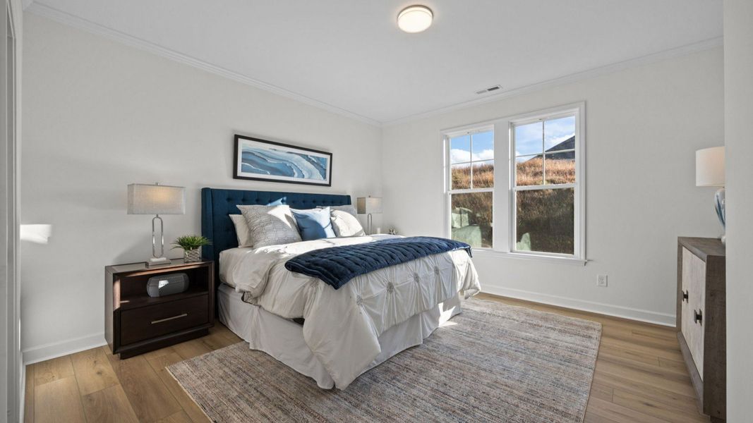 Furnished interior in a model home at Village at Maple Leaf Farm in King (Image 9).