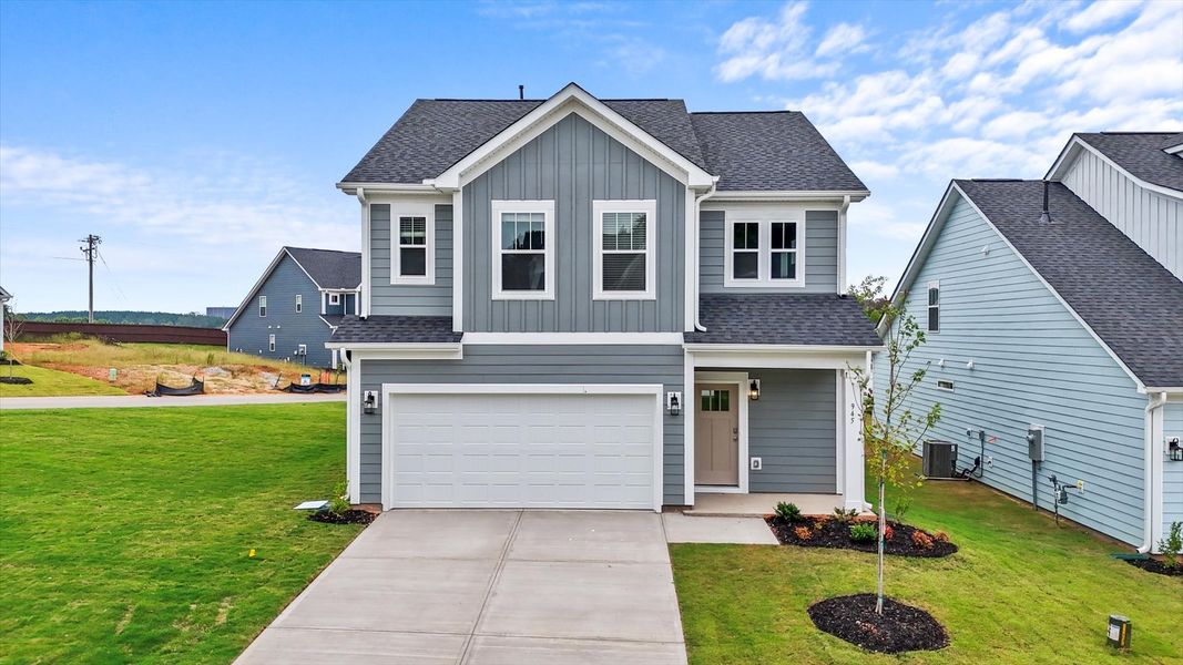 Front exterior of a home in the Farms at Bellingham community, located in Mooresville, NC (Image 11).