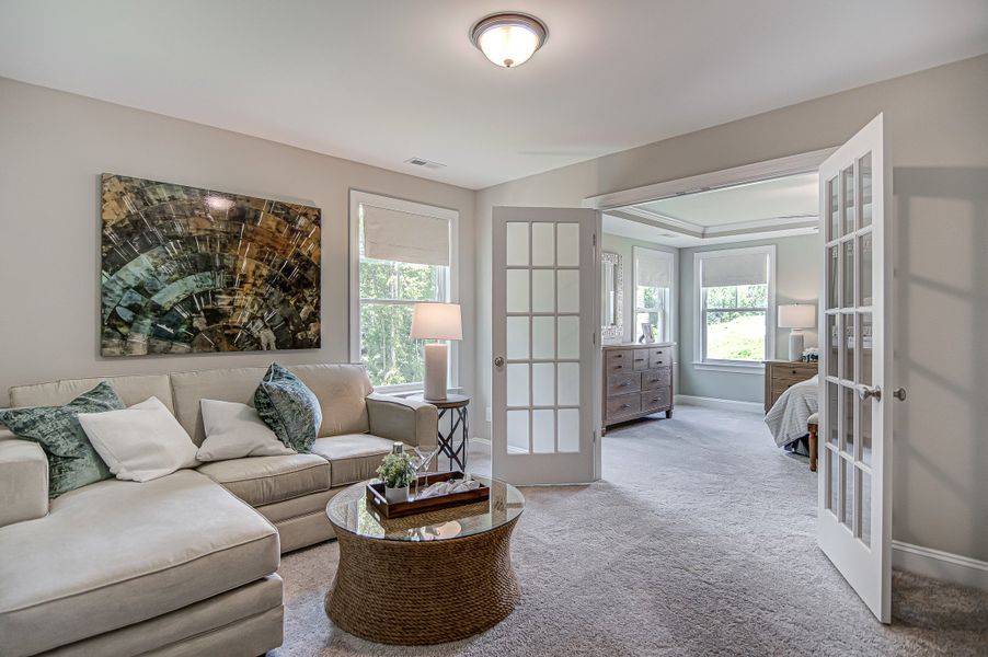 Furnished interior in a model home at Cottages at Piper Village in Trinity (Image 9).