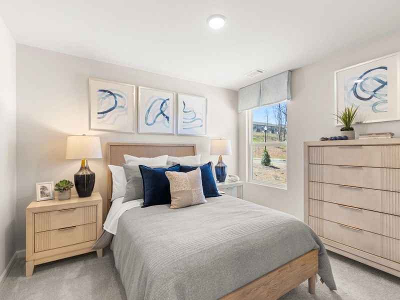 Furnished interior in a model home at The Bluffs in Canton (Image 11).
