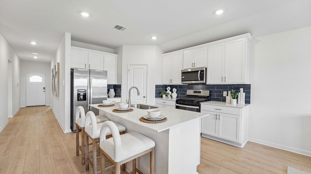 Furnished interior in a model home at Briarwood in Elgin (Image 18).