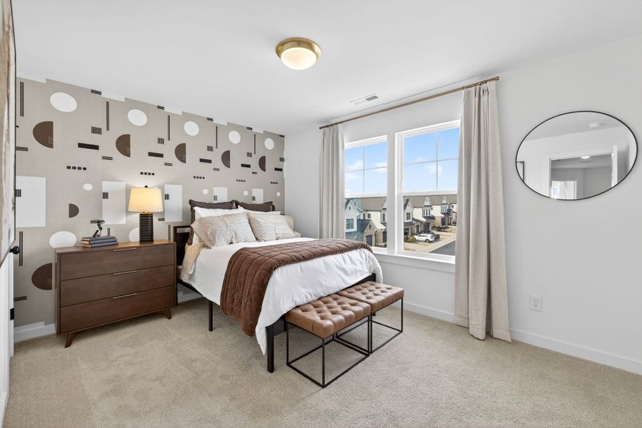Furnished interior in a model home at North District at Flowers Plantation Townhomes in Clayton (Image 16).