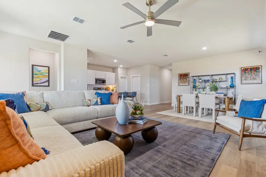 Living Area in the Hayden home plan by Trophy Signature Homes - REPRESENTATIVE PHOTO