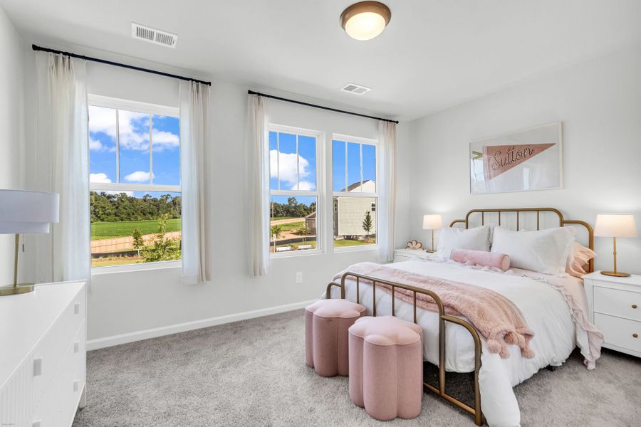 Furnished interior in a model home at Reeves Crossing in St. George (Image 15).
