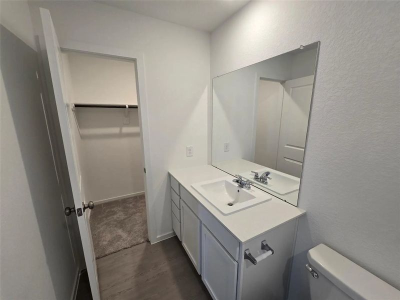 Furnished interior in a model home at Monarch Landing: Watermill in Needville (Image 3).