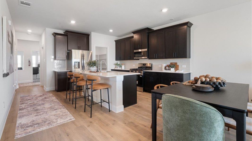 Furnished interior in a model home at Waterbend in Euless (Image 4).