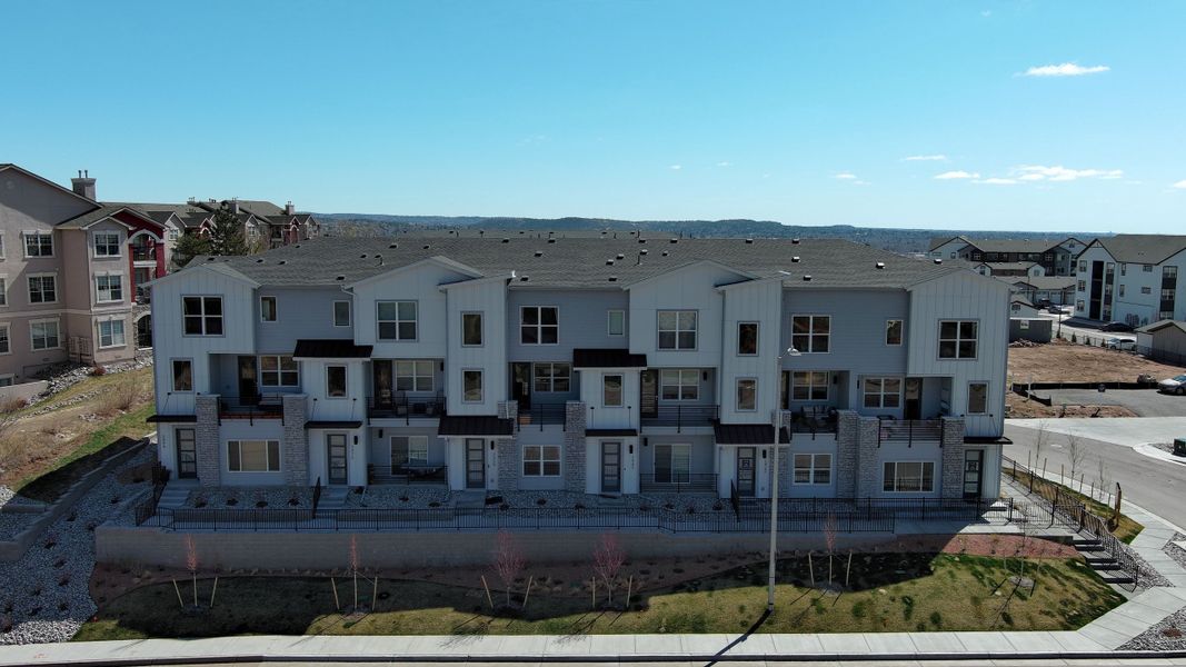 Front exterior of a home in the The Vistas at West Mesa community, located in Colorado Springs, CO (Image 1).