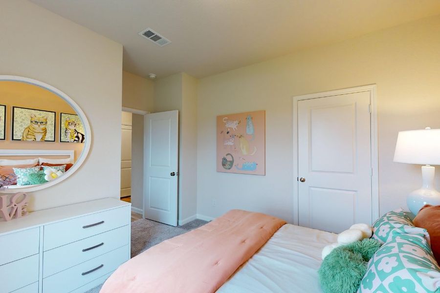 A bedroom with a bed and a lamp. A bedroom with a bed and a lamp.