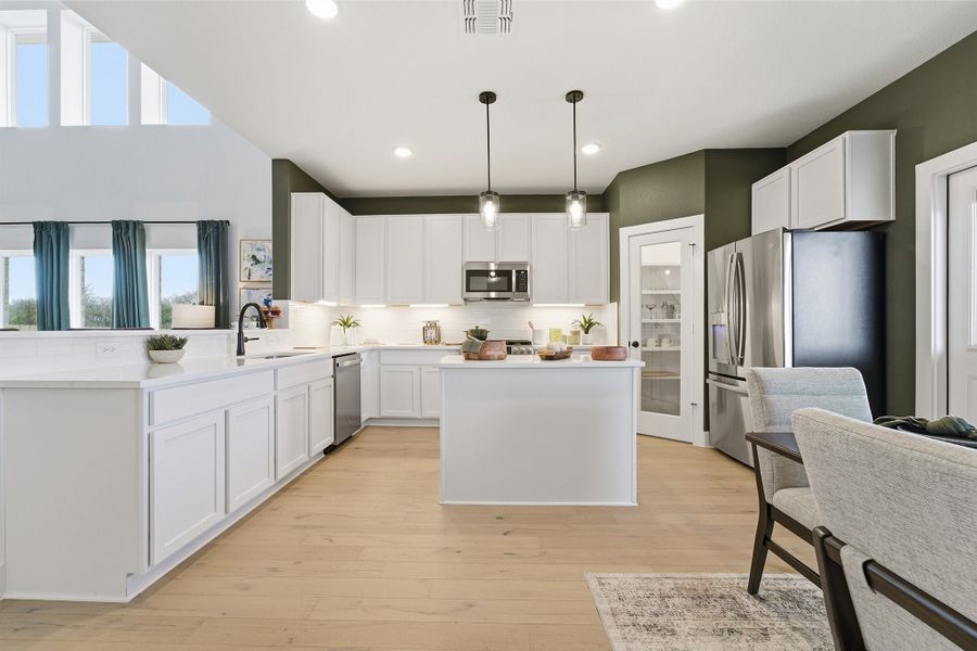 Furnished interior in a model home at Infinity Square in Kyle (Image 24).