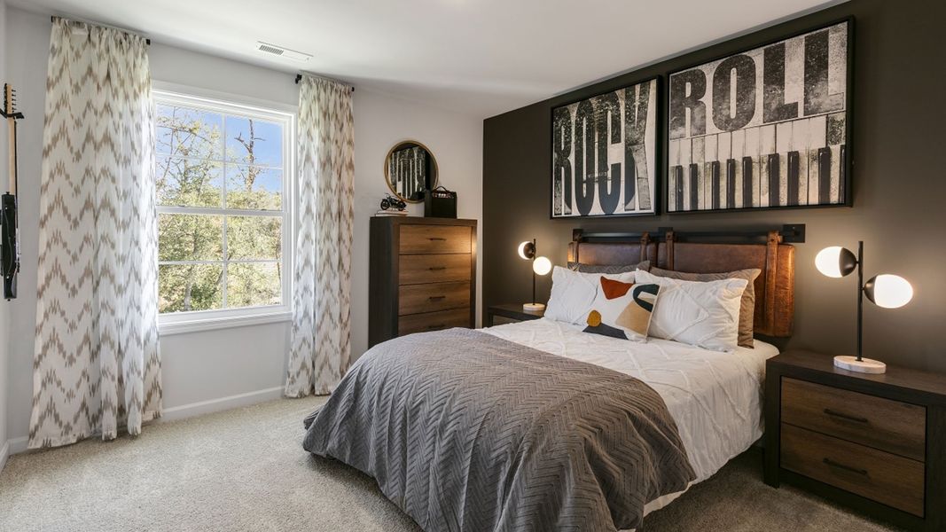 Furnished interior in a model home at The Meadows at Kinsley in Jamestown (Image 17).