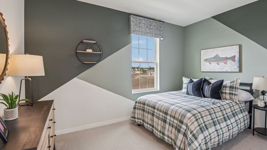 Furnished interior in a model home at Finley Woods in Gainesville (Image 20).