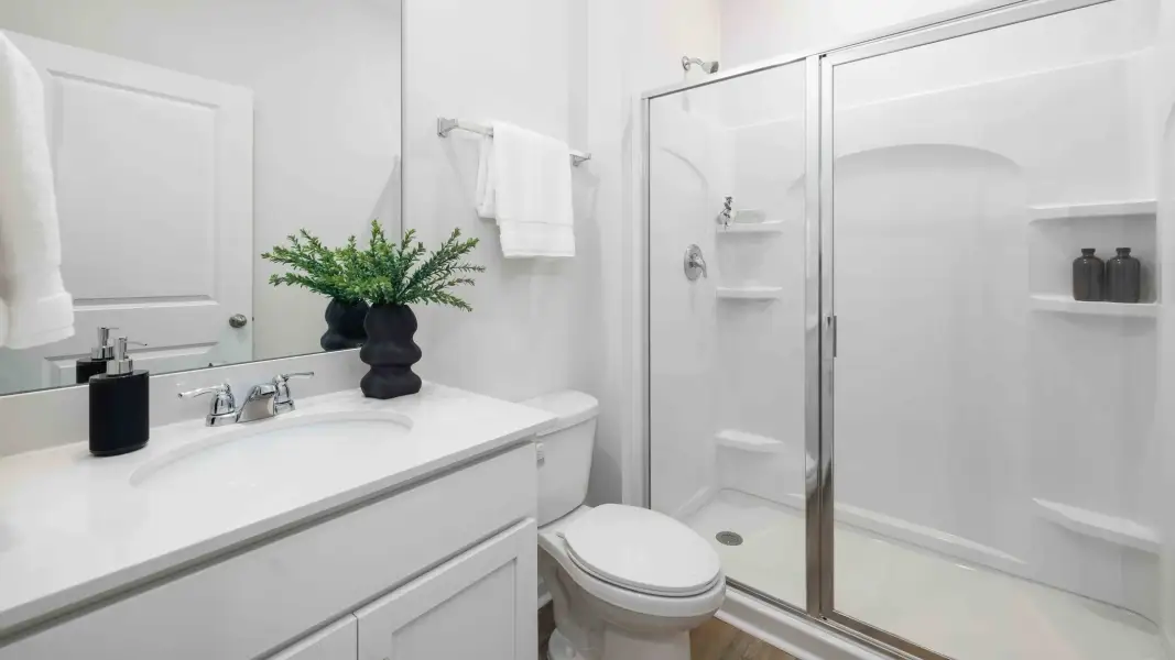 Furnished interior in a model home at Sweetwater Village in Rockwell (Image 22).