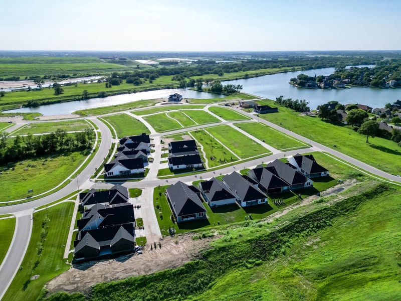 Aerial view of the The Courtyards at The Moorings community in Wichita, KS, showing layout and nearby surroundings (Image 6).