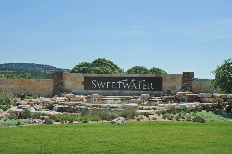 Entrance to the Sweetwater community in Austin, TX, featuring signage and landscaping (Image 2).