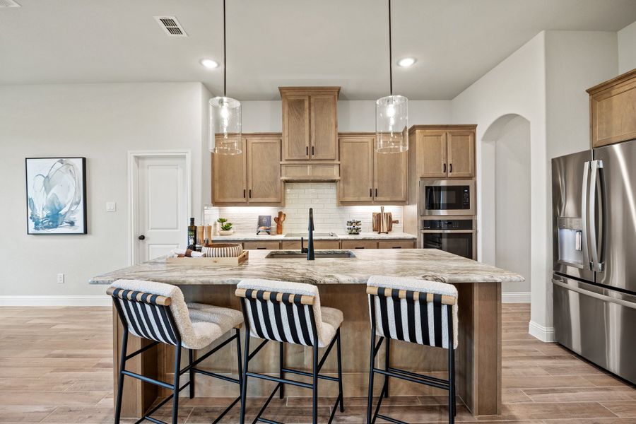 Furnished interior in a model home at Mockingbird Hills - Signature Series in Joshua (Image 13).